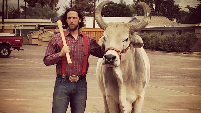 Madison Bumgarner In His Element Posing With an Ox 
