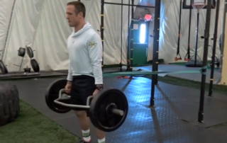 Trap Bar Deadlift with Band Hip Pull