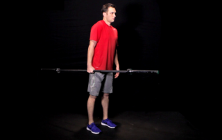This Shrug Variation Builds Strong Traps, Forearms and Core Muscles