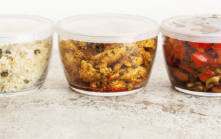 dinner meals or meal preps in glass containers