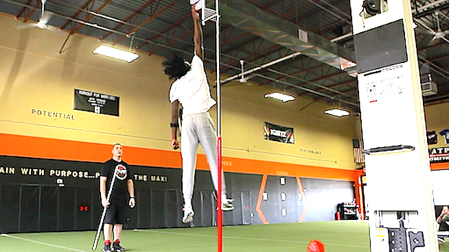 athletic male training his vertical jump