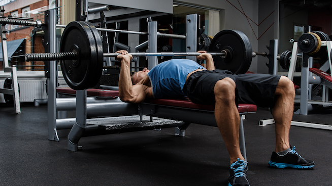 Why You Actually Should Arch Your Back While You Bench Press