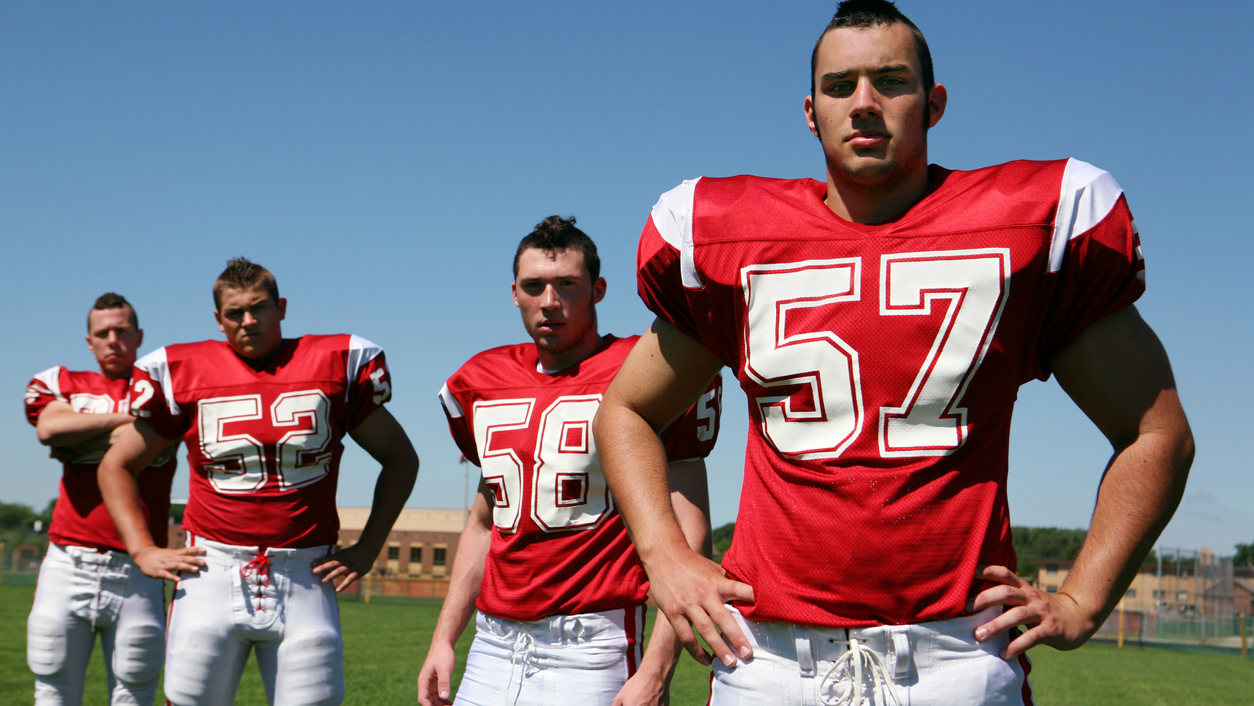 Football players with hardcore attitude – ready to bring it. Hard shadows added to accentuate the bad attitude, especially around the the eyes.